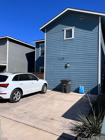 a car parked in front of a house