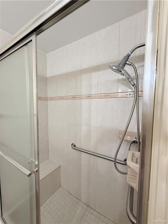 807 East 21st Street, Unit 8 Mission, TX 78572 - Photo 12 of 15 a bathroom with a shower