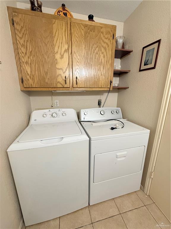 807 East 21st Street, Unit 8 Mission, TX 78572 - Photo 15 of 15 a utility room with dryer and washer
