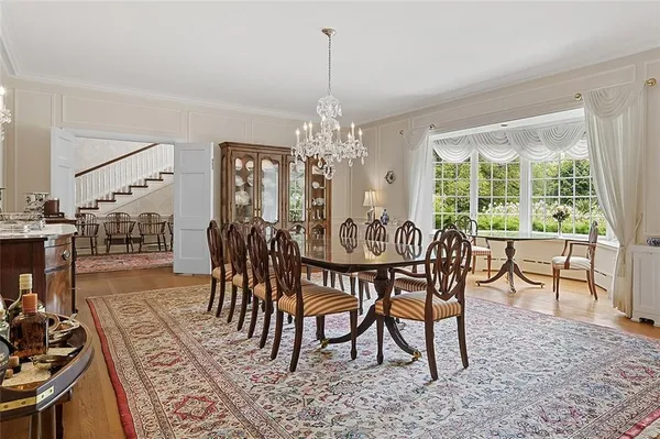 a view of a dining room with furniture window and outside view