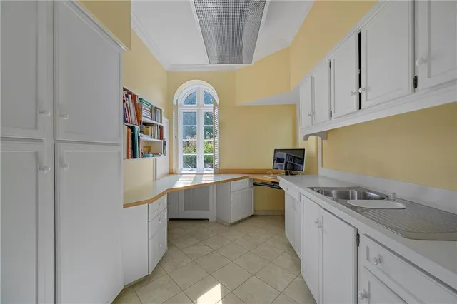 a kitchen with stainless steel appliances granite countertop a sink and cabinets