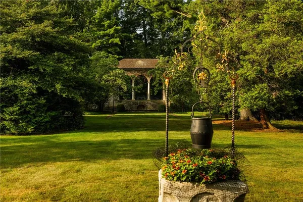 a garden view with a seating space