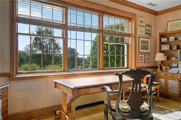 a view of a dining room with furniture window and outside view