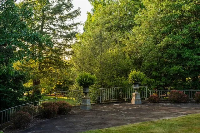a view of a deck with a big yard