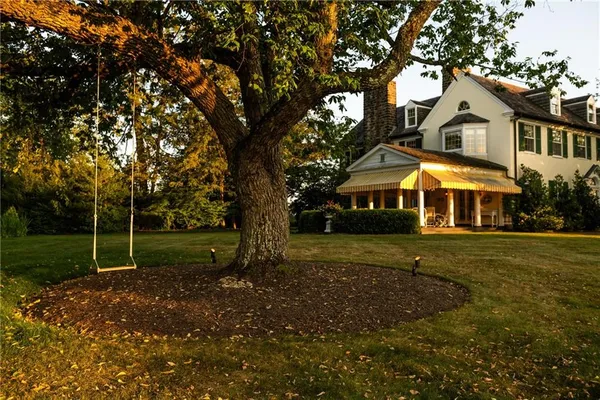a view of house with outdoor space