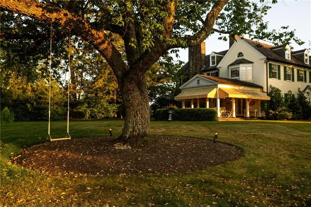 a view of house with outdoor space