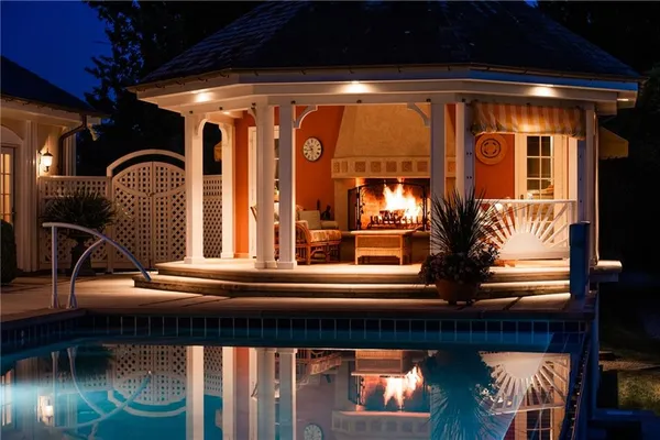 a view of fountain in front of retail shop