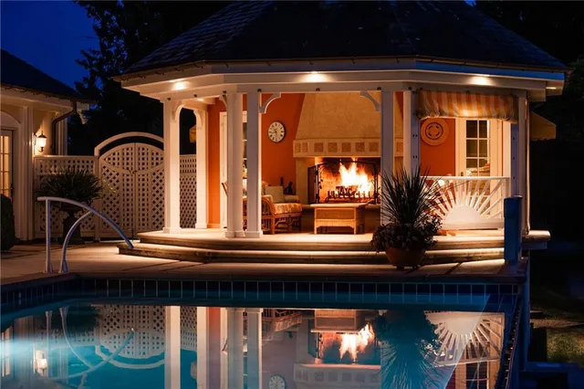 a view of fountain in front of retail shop