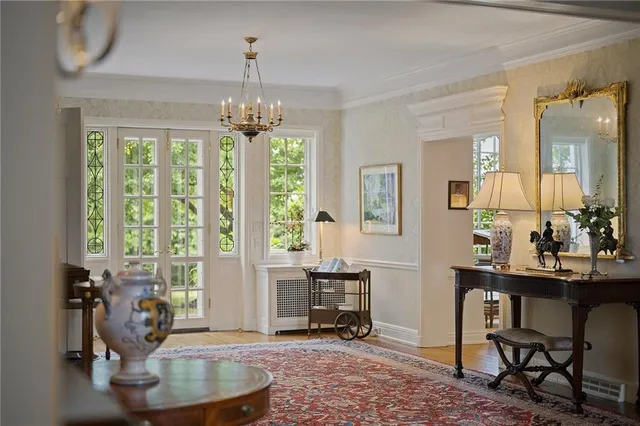 a view of a dining room with furniture window and outside view