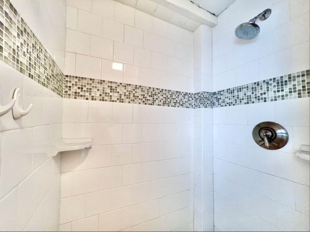 26 Chiswick Road, Unit 6 Boston, MA 02135 - Photo 14 of 19 a bathroom with a shower and a sink