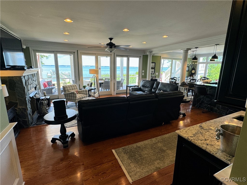 1388 South N End Road Deltaville, VA 23043 - Photo 10 of 50 Hardwood, wet bar and sliders to the covered porch