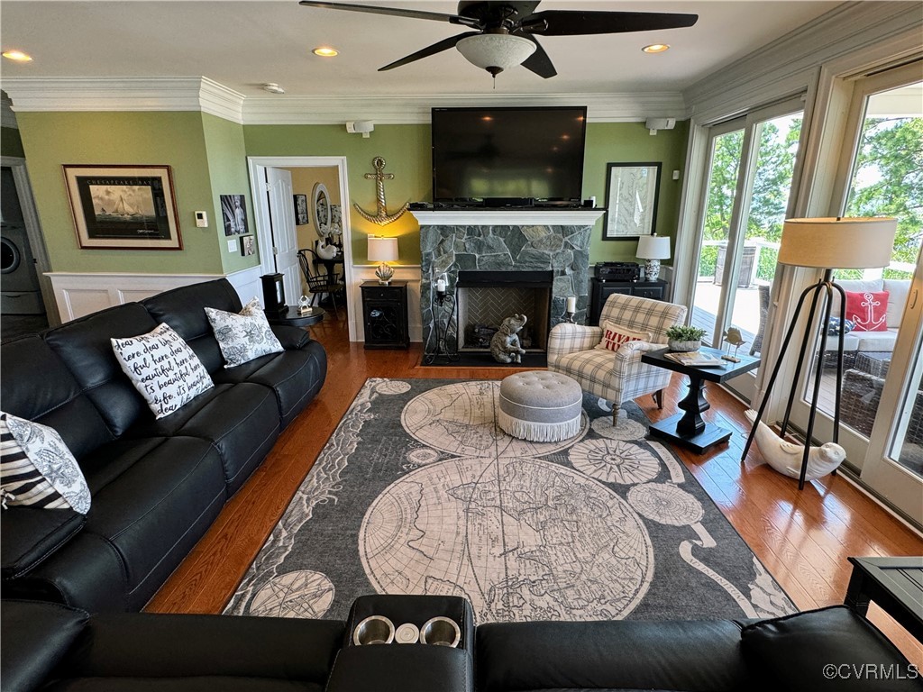 1388 South N End Road Deltaville, VA 23043 - Photo 11 of 50 Stone fireplace with gas logs, ceiling fan