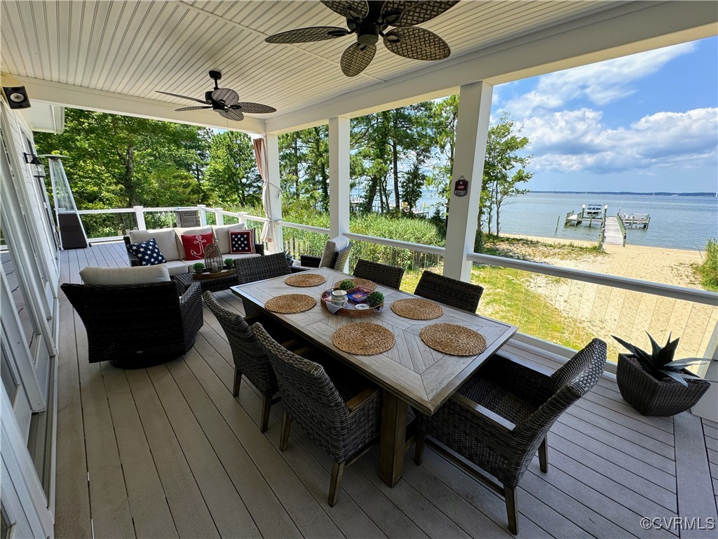 1388 South N End Road Deltaville, VA 23043 - Photo 17 of 50 view of expansive porch and deck the length of the