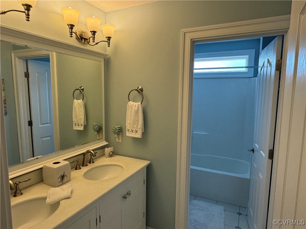 1388 South N End Road Deltaville, VA 23043 - Photo 29 of 50 3rd level full bath with shower and tub, tile floo