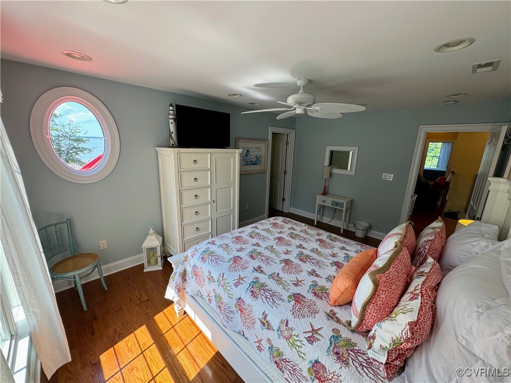 1388 South N End Road Deltaville, VA 23043 - Photo 32 of 50 4th bedroom with hardwood, celing fan, window trea