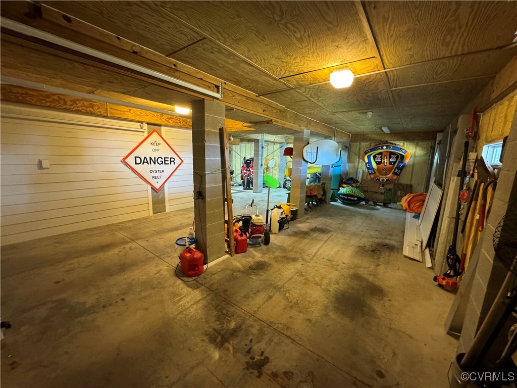 1388 South N End Road Deltaville, VA 23043 - Photo 38 of 50 4 car conditioned garage with plenty of room for a