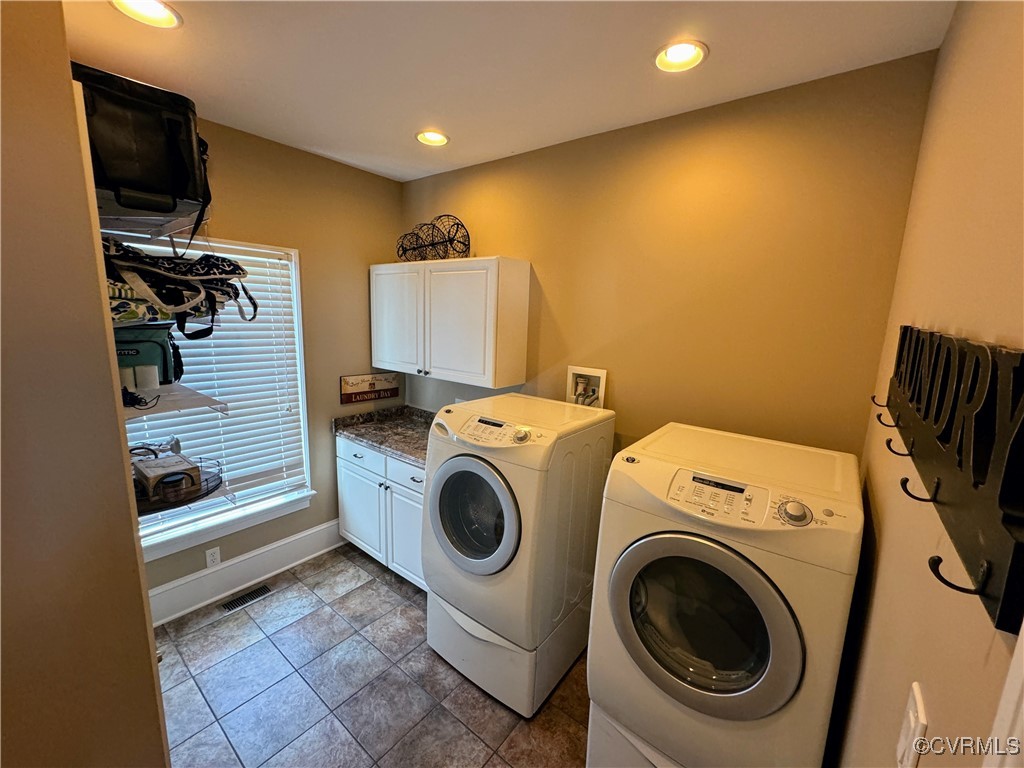 1388 South N End Road Deltaville, VA 23043 - Photo 8 of 50 Main level laundry room with tile floor