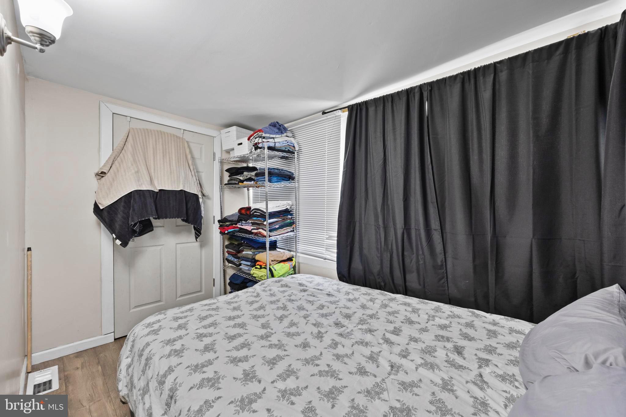 452 Kyle Road Crownsville, MD 21032 - Photo 15 of 46 a bedroom with a bed and a closet