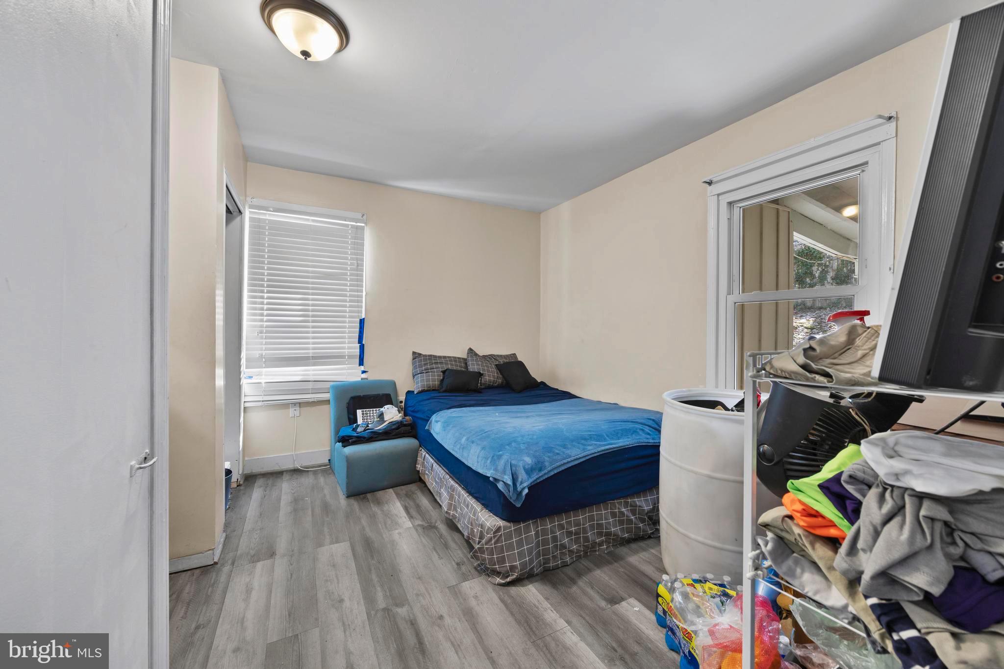 452 Kyle Road Crownsville, MD 21032 - Photo 16 of 46 a bedroom with bed and a window