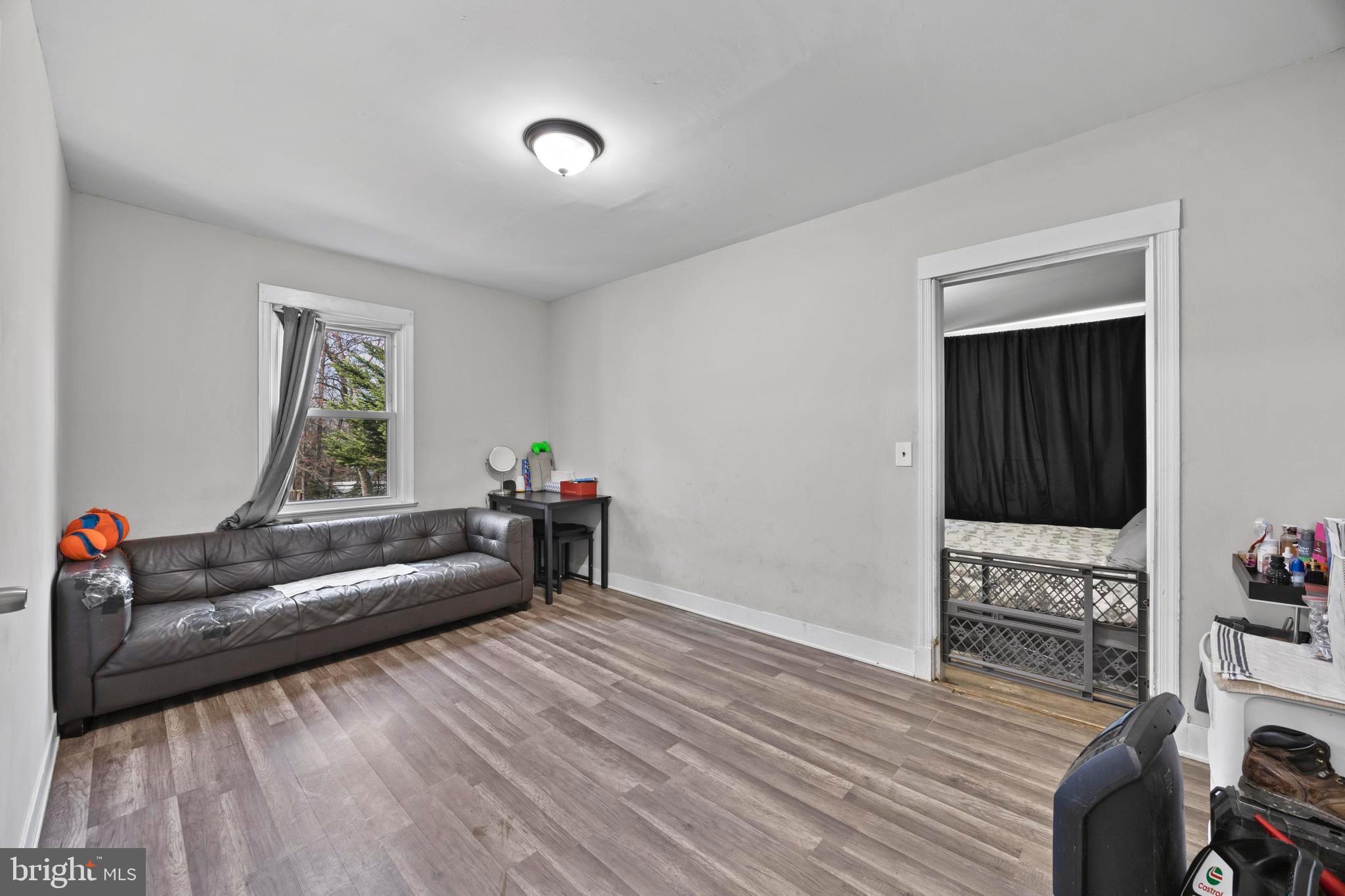 452 Kyle Road Crownsville, MD 21032 - Photo 20 of 46 a living room with furniture and a flat screen tv