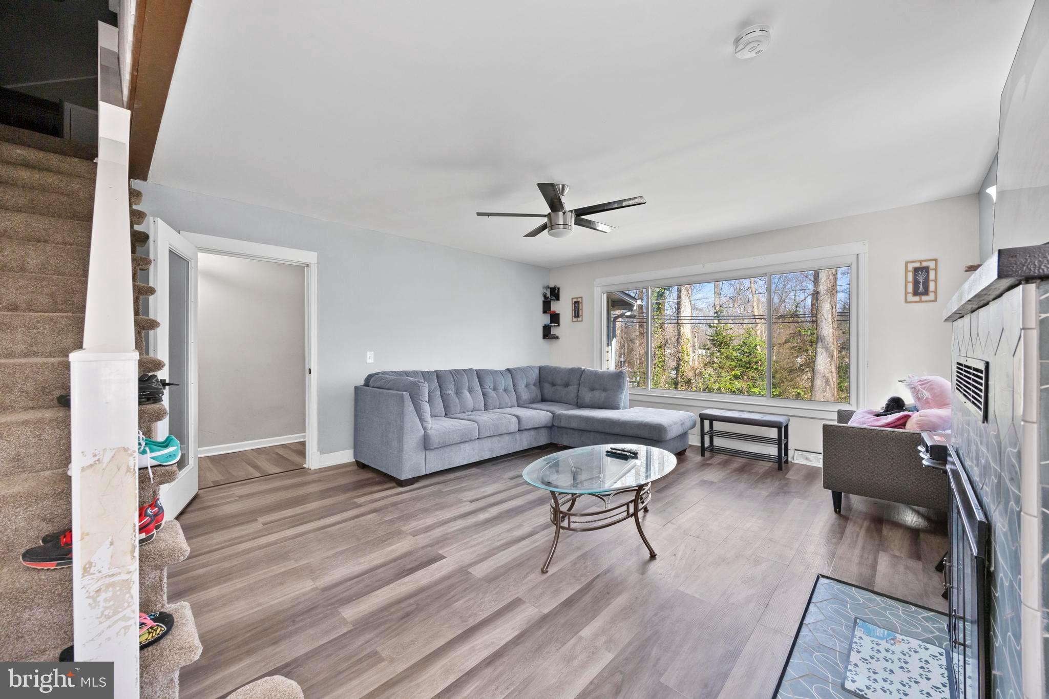 452 Kyle Road Crownsville, MD 21032 - Photo 23 of 46 a living room with furniture and a large window