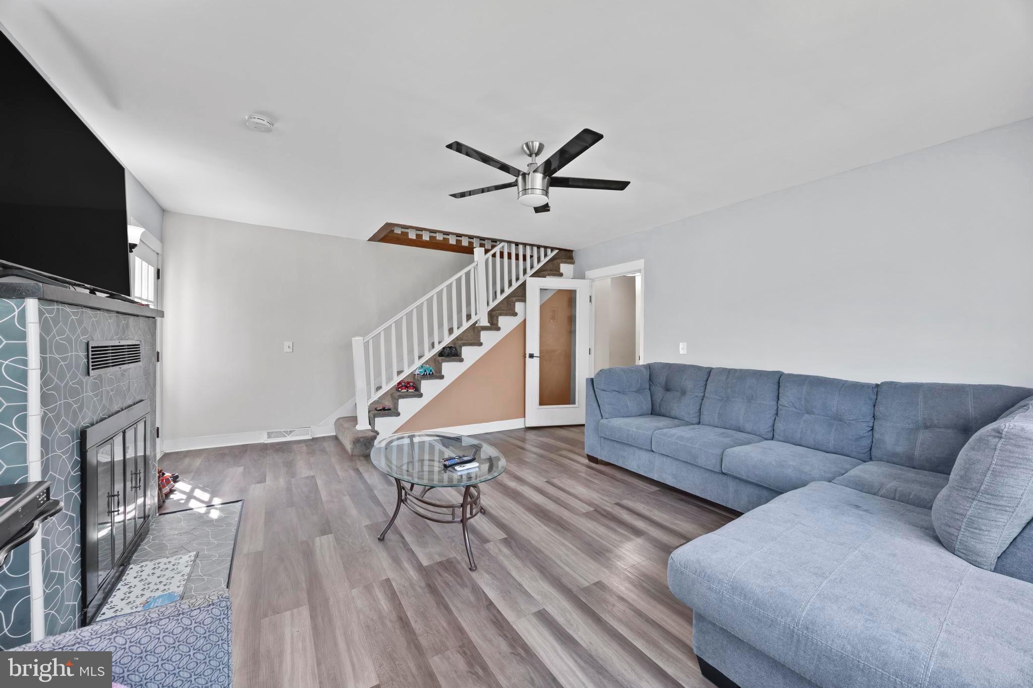 452 Kyle Road Crownsville, MD 21032 - Photo 25 of 46 a living room with furniture and a flat screen tv