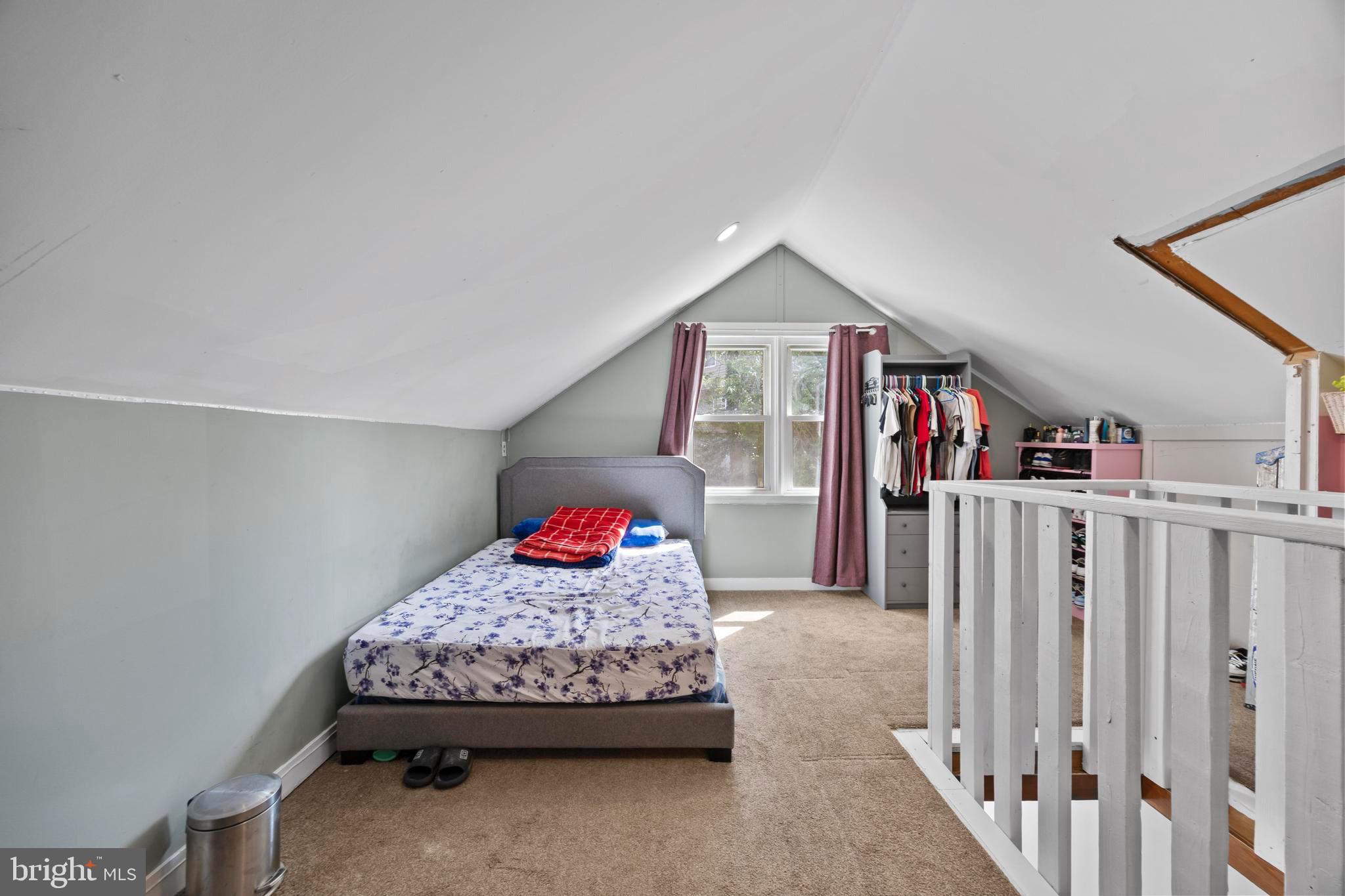 452 Kyle Road Crownsville, MD 21032 - Photo 26 of 46 a bedroom with furniture and a book shelf