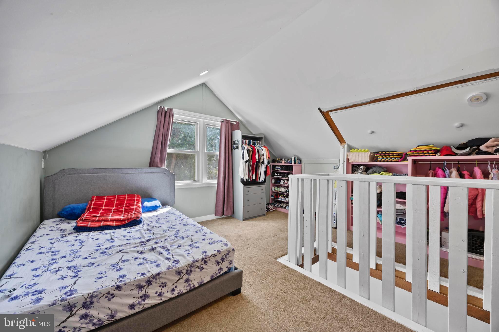 452 Kyle Road Crownsville, MD 21032 - Photo 27 of 46 a bedroom with a large bed and a large closet