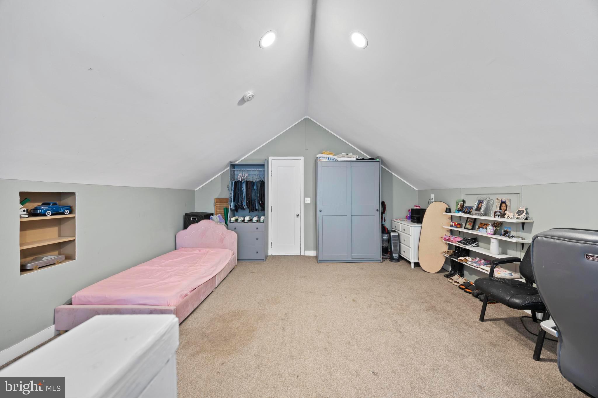 452 Kyle Road Crownsville, MD 21032 - Photo 28 of 46 a bedroom with furniture and a book shelf