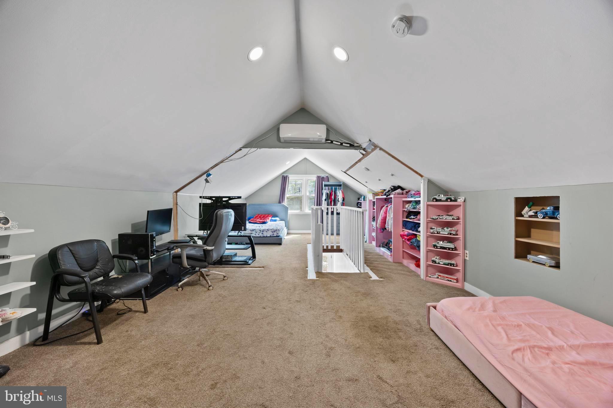 452 Kyle Road Crownsville, MD 21032 - Photo 30 of 46 a bedroom with furniture and a chandelier