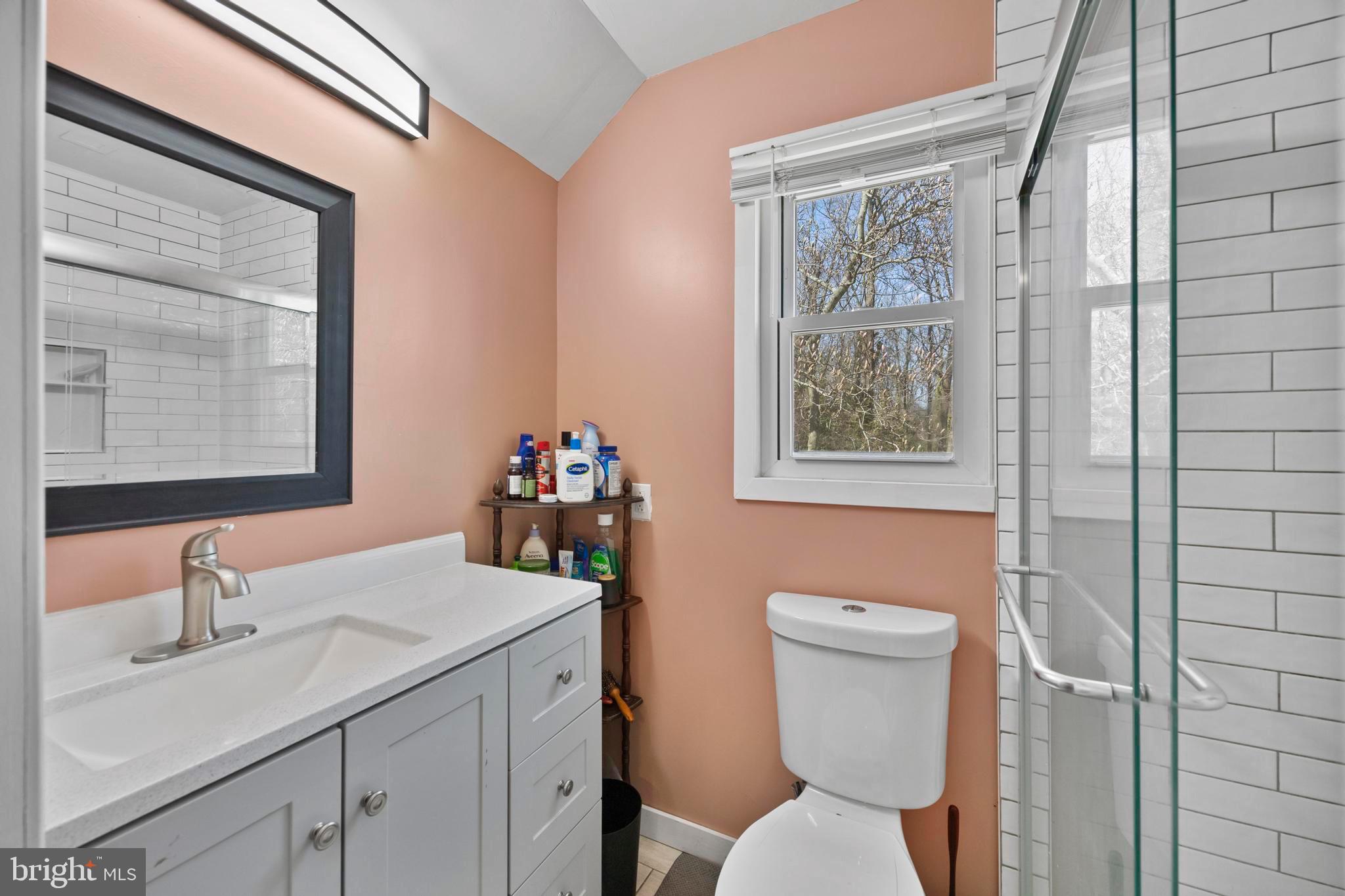452 Kyle Road Crownsville, MD 21032 - Photo 32 of 46 a bathroom with a toilet sink and mirror
