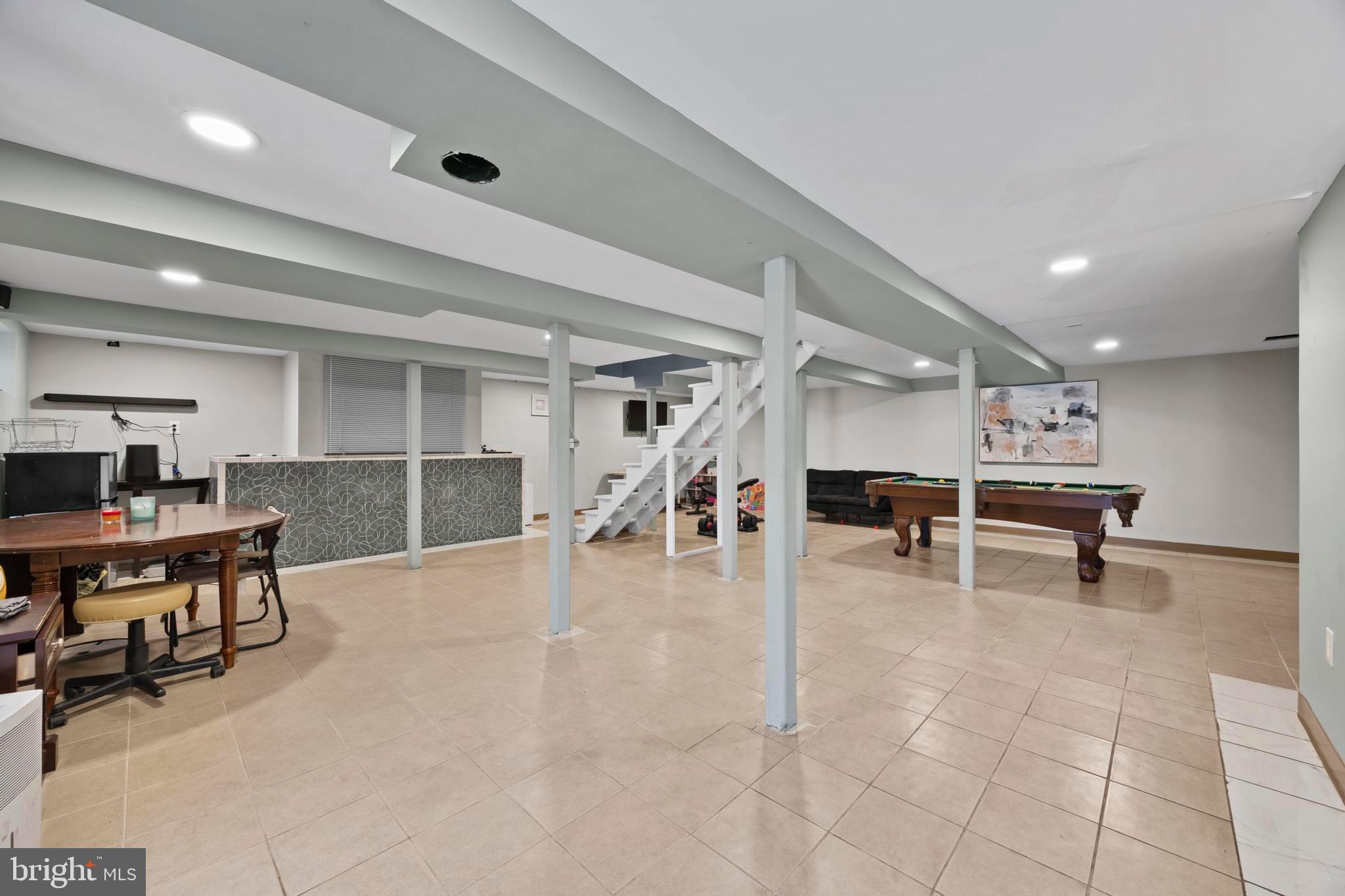 452 Kyle Road Crownsville, MD 21032 - Photo 34 of 46 a view of a room with lots of furniture and wooden floor