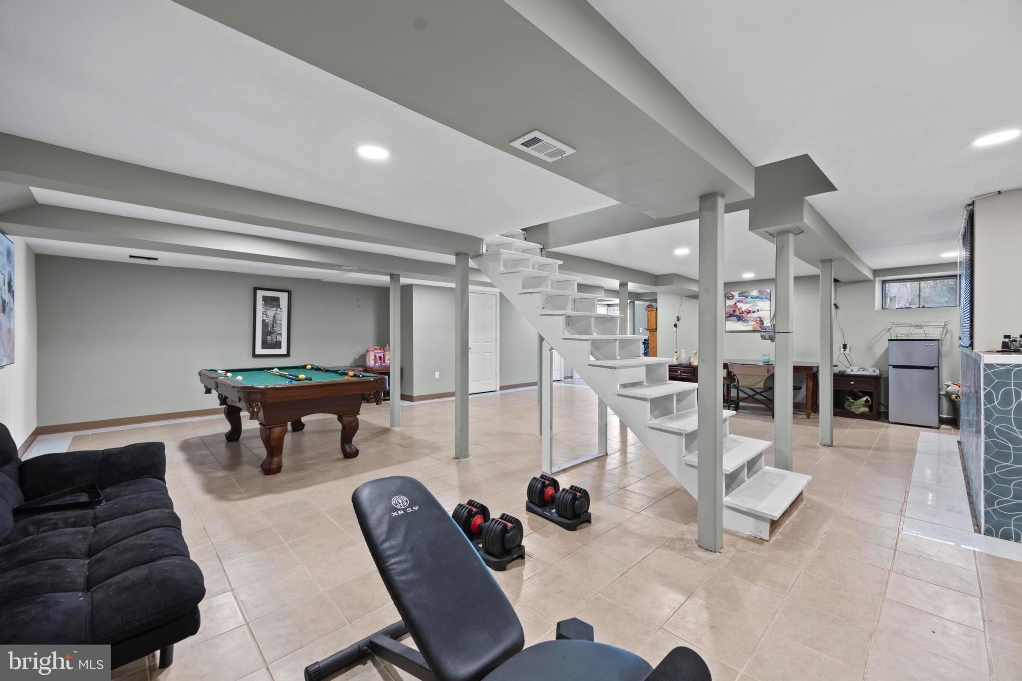 452 Kyle Road Crownsville, MD 21032 - Photo 39 of 46 a livingroom with furniture and a flat screen tv