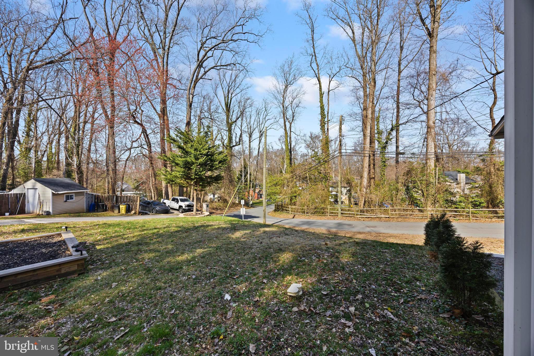 452 Kyle Road Crownsville, MD 21032 - Photo 46 of 46 a backyard of a house with lots of green space