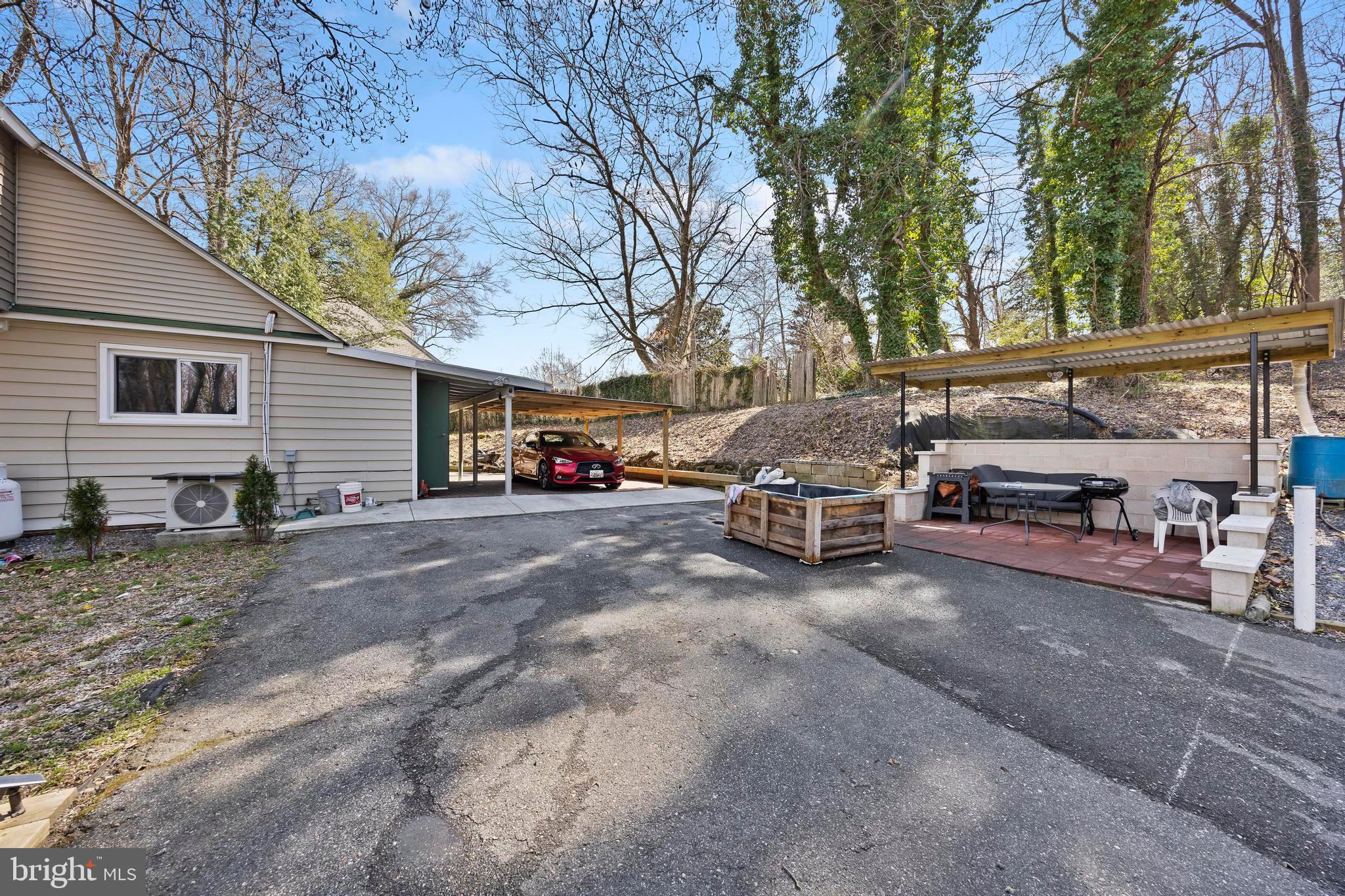 452 Kyle Road Crownsville, MD 21032 - Photo 6 of 46 a view of a cars parked in front of a house