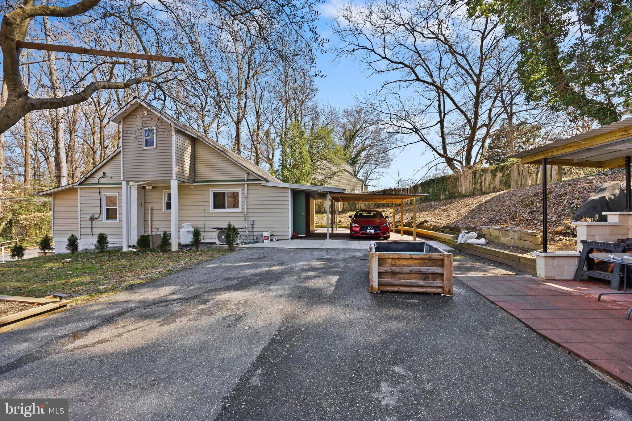 452 Kyle Road Crownsville, MD 21032 - Photo 7 of 46 a view of a street with a house and a road