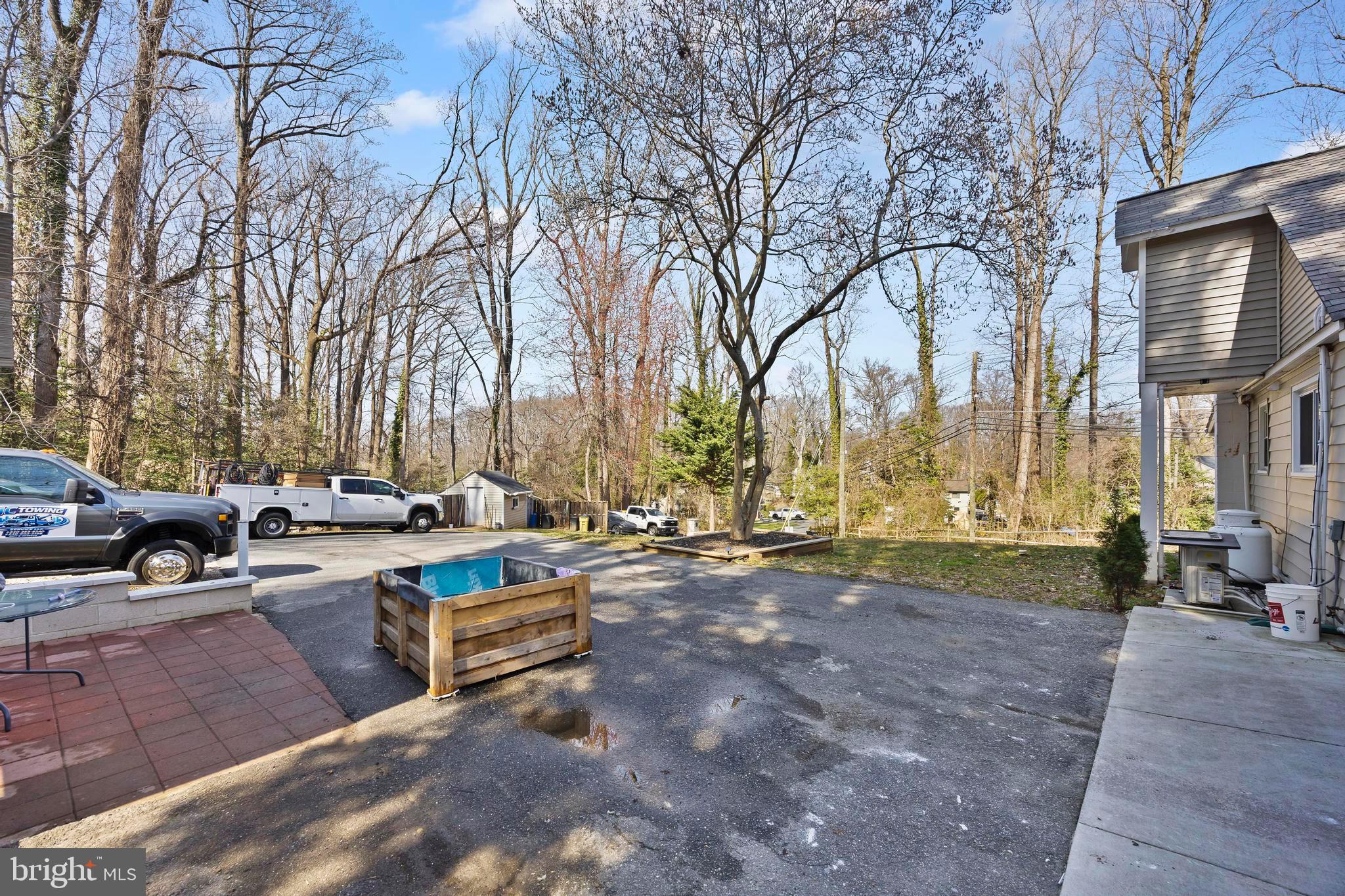 452 Kyle Road Crownsville, MD 21032 - Photo 8 of 46 a view of a yard with sitting area