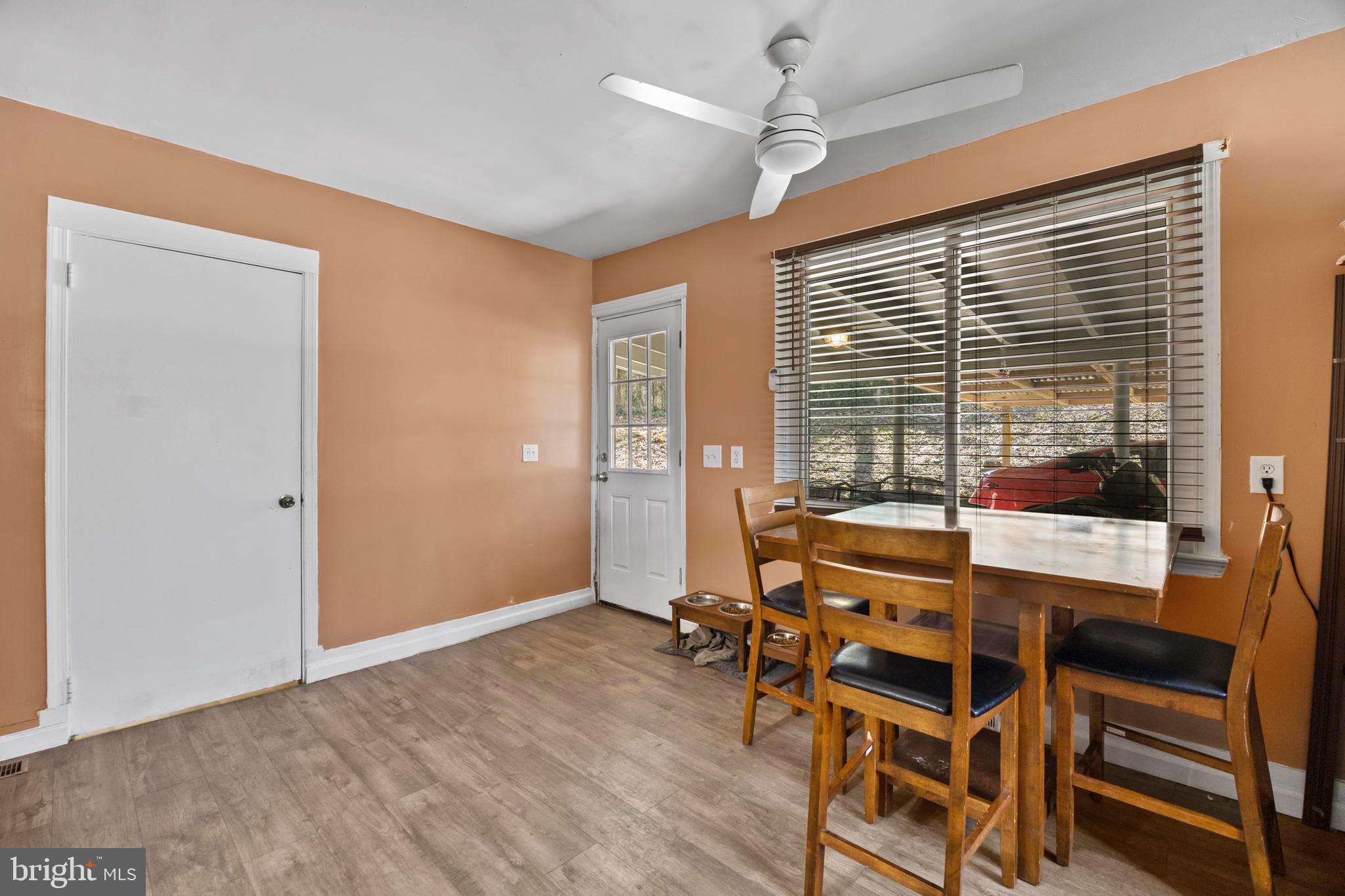 452 Kyle Road Crownsville, MD 21032 - Photo 9 of 46 a dining room with furniture and windows