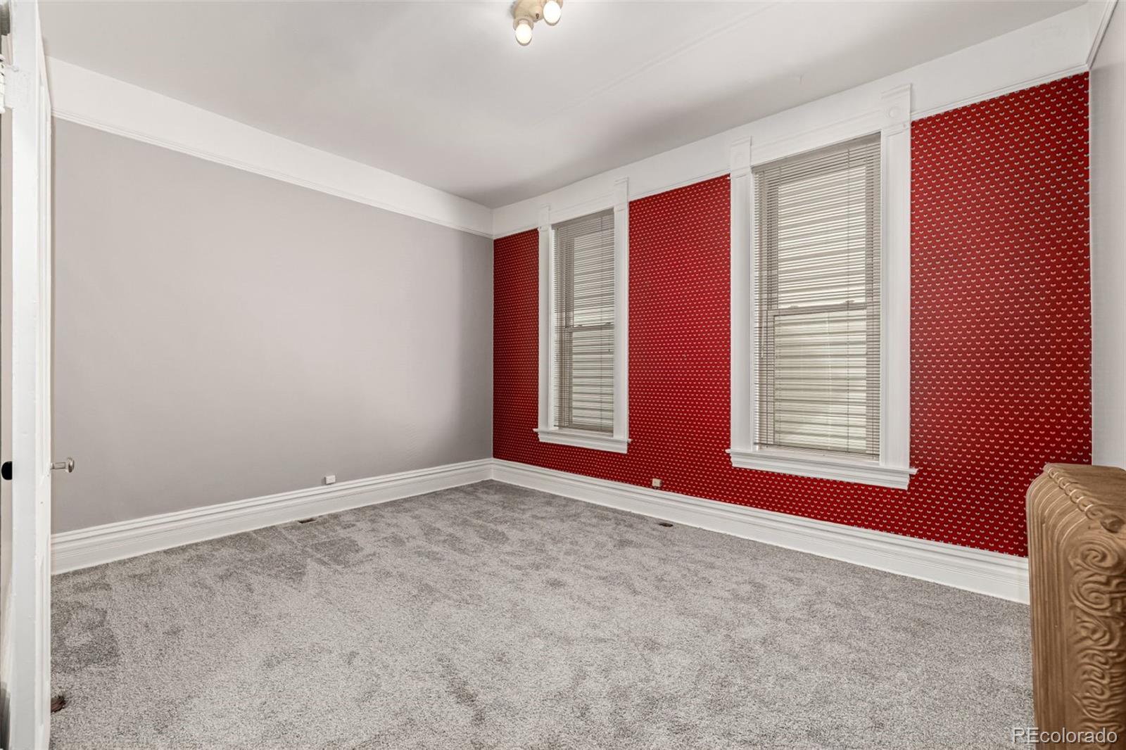 107 Pearl Street, Unit B Denver, CO 80203 - Photo 26 of 39 a view of an empty room with window
