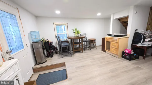 a view of a workspace with furniture and a livingroom