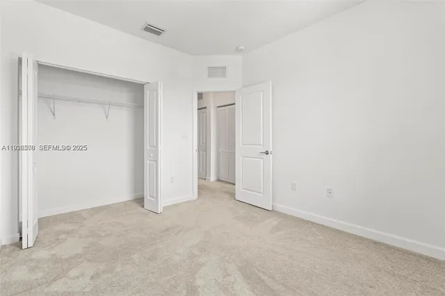 an empty room with window