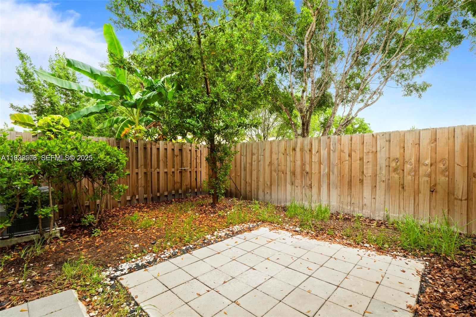 2668 Southeast 19th Street Homestead, FL 33035 - Photo 27 of 37 a view of wooden fence