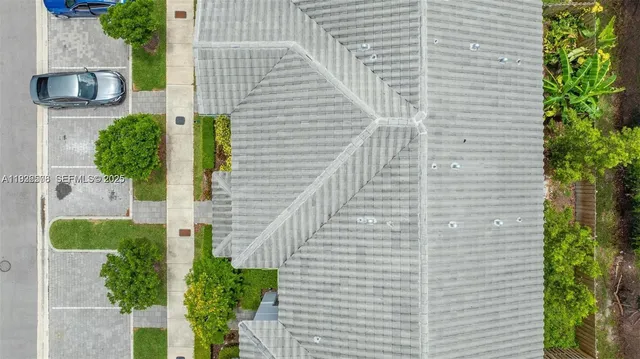 swimming pool view with a seating space