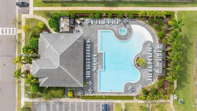 an aerial view of a house with a garden