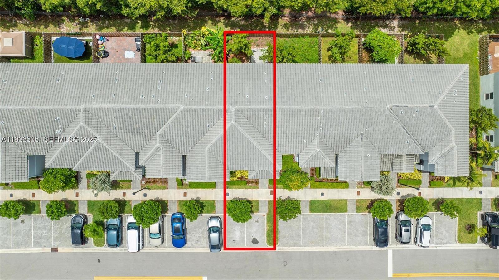 2668 Southeast 19th Street Homestead, FL 33035 - Photo 34 of 37 an aerial view of multiple houses with a yard