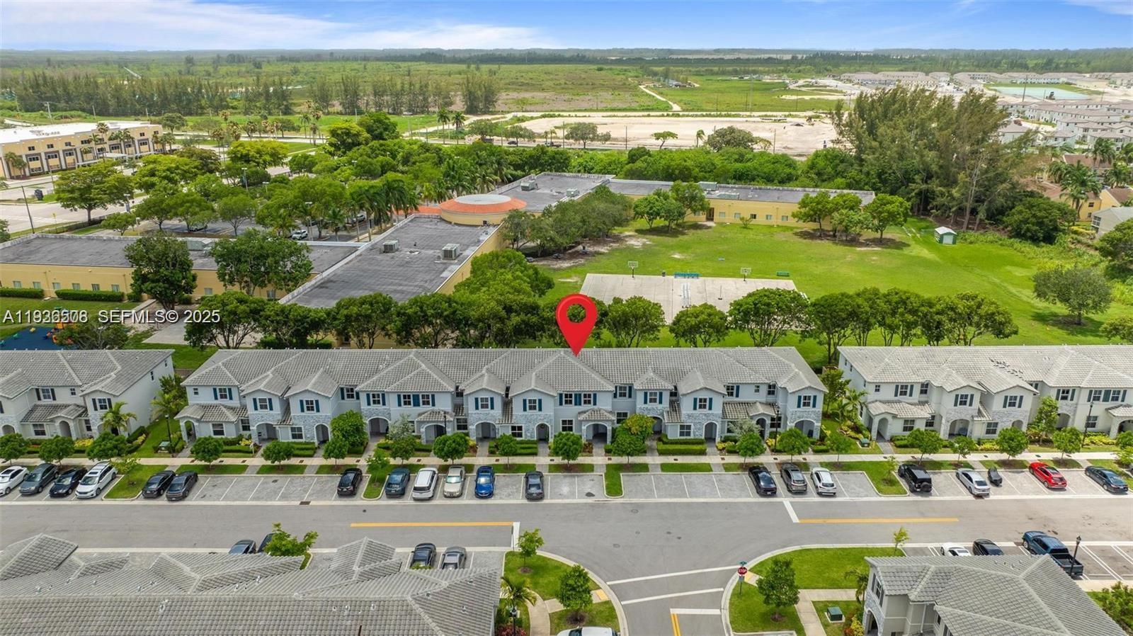 2668 Southeast 19th Street Homestead, FL 33035 - Photo 36 of 37 an aerial view of houses with yard
