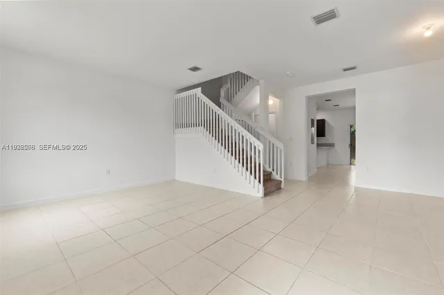 a view of a hallway with entryway