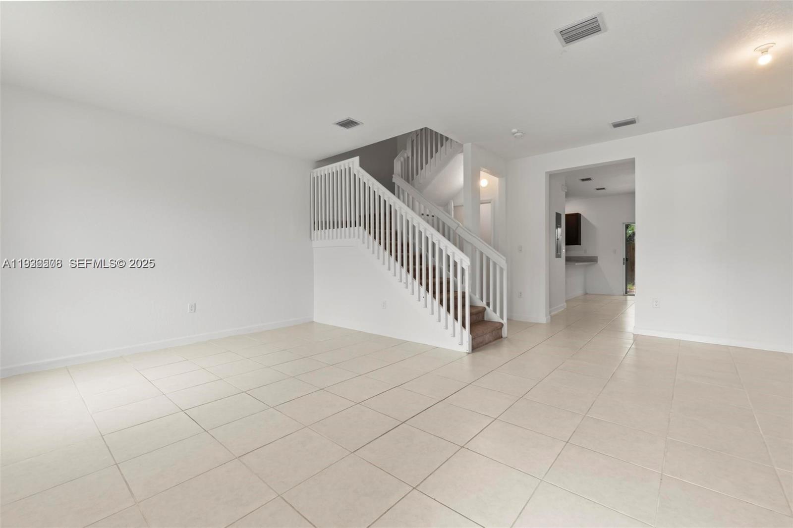 2668 Southeast 19th Street Homestead, FL 33035 - Photo 4 of 37 a view of a hallway with entryway