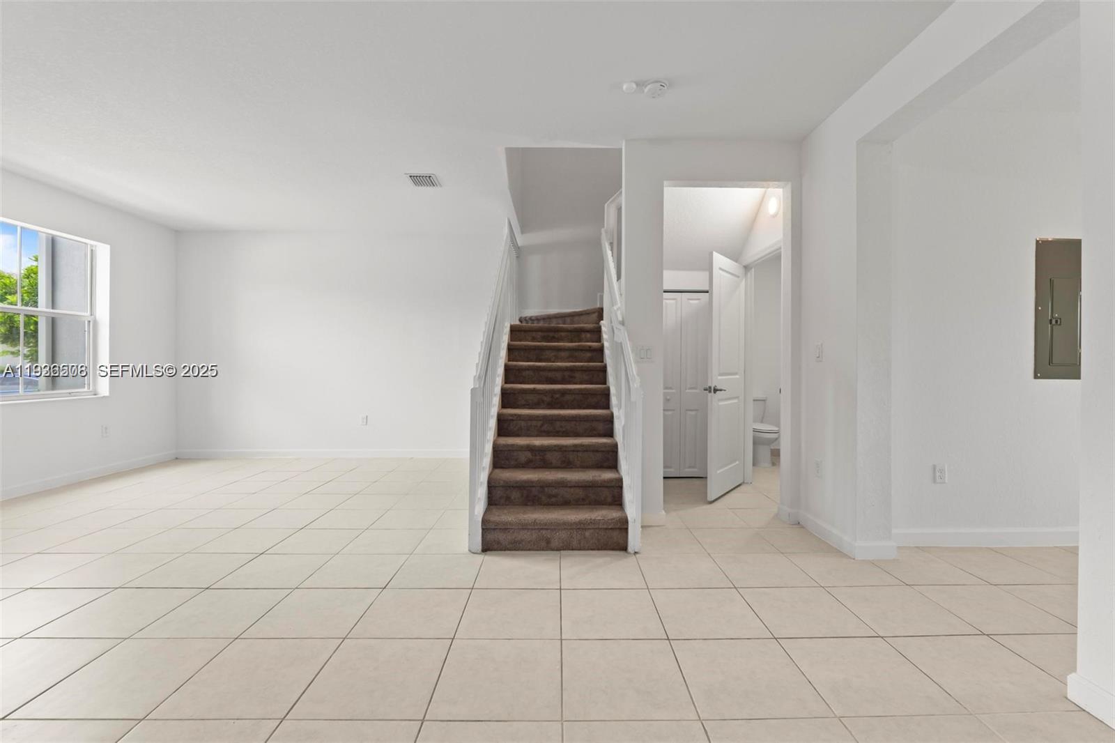 2668 Southeast 19th Street Homestead, FL 33035 - Photo 7 of 37 an empty room with windows