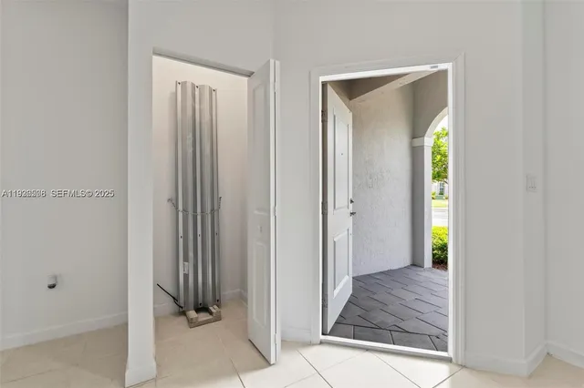 a view of an entryway with stairs